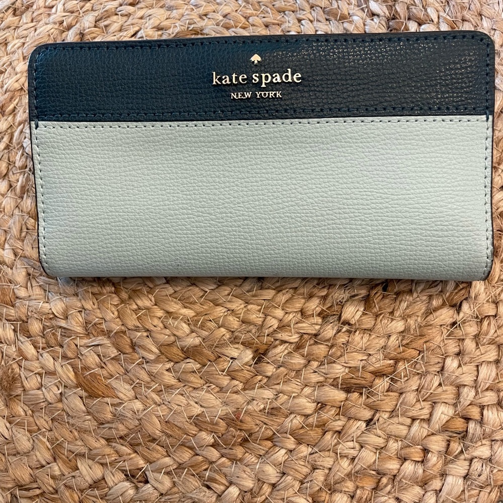 Kate Spade light and dark green wallet.